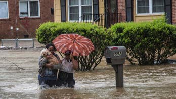 Storms soak North Carolina and threaten river flooding