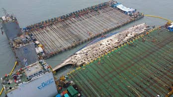 How do you lift 6,800-ton ferry from seafloor? Delicately