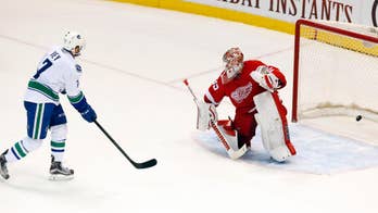 Vey scores in 7th round of shootout to lift Canucks to 4-3 win over Red Wings