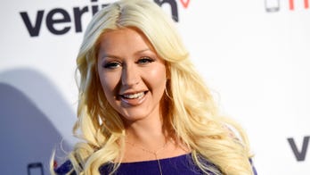 Christina Aguilera gives off classic Hollywood vibes in swimming pool pics: 'Cheers'
