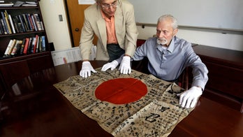 WWII veteran returns Japanese flag taken from fallen enemy soldier