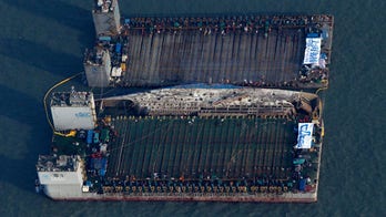 Sunken South Korean ferry set to be loaded on transport vessel