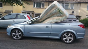Cops stop car with mattress in passenger seat