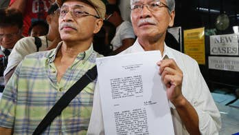 Philippine court urged to order Marcos' remains exhumed