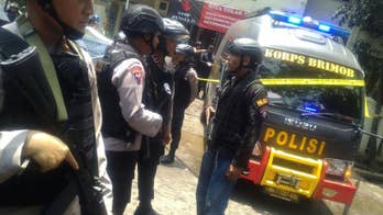 Indonesian police shoot suspected militant after standoff
