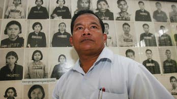 Photographer at Khmer Rouge torture center enters politics
