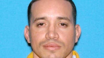 Manhunt in police officer's slaying comes to violent end