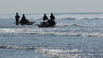 Banned from boats in Myanmar, Rohingya fish on rafts of junk