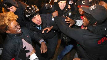 The Latest: 5 people arrested in Chicago protests sparked by video of 2014 police shooting