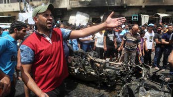 Iraq: Car bombing in Baghdad commercial area kills 14 people