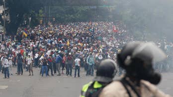 Venezuela opposition plans silent procession, road sit-ins