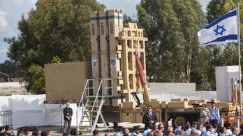 Israel PM warns enemies at missile defense ceremony