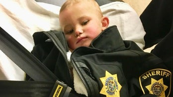 Missing infant found naked and unharmed in Oregon woods; dad arrested, police say