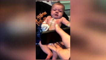 Watching Dallas Cowboys soothes newborn baby girl