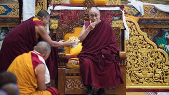 Dalai Lama says it's for people to decide fate of his office