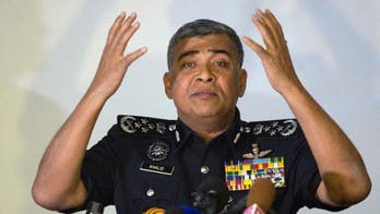 The Latest: Son of slain N. Korean not in Malaysia: police