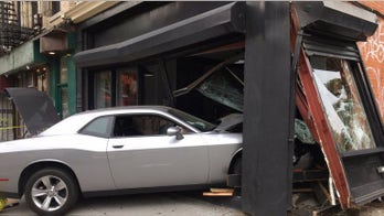 Car plows into Brooklyn cafe, injures 4
