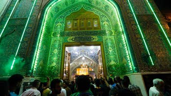 Tens of thousands Shiite pilgrims converge on Baghdad shrine