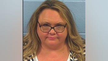 Married teacher and grandmother, 51, arrested for 'sex act' with student