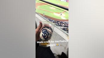 San Diego Padres fan catches foul ball in beer cup, celebrates by chugging drink