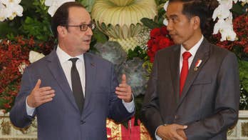 France pledges $2.6 billion for Indonesia as Hollande visits