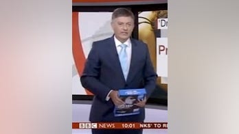 BBC News anchor mistakes pack of printer paper for iPad during live report