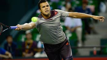 Injured Tsonga crashes out of Japan Open