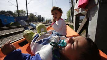 The Latest: Pope, patriarch to meet refugees next week