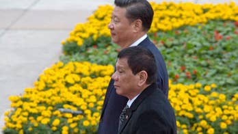 Philippine leader meets China's president in charm offensive
