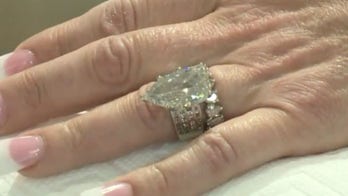 Couple digs through trash in hazmat suits after losing wedding rings