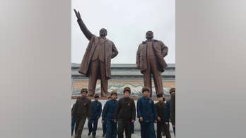 North Koreans, in eye of storm, fete leader's birthday