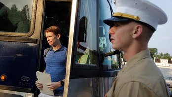AP PHOTOS: 'Plebes' begin their 1st day at the Naval Academy with haircuts, how-to on saluting