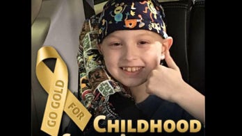 Teen asks 9-year-old boy battling cancer to prom