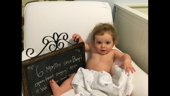 Maternal instinct leads to baby's life-saving open heart surgery