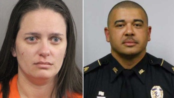 Officer's widow held on 'probable cause' in connection with his death