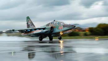 Russia steps up military presence in Syria, despite Putin promise