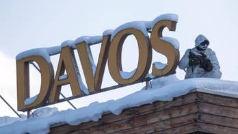 The Latest: Davos organizers urge shift in economic policy