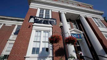 Police rally as mayor says Black Lives Matter banner stays