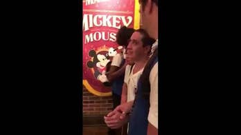 Video showing blind man meeting Mickey Mouse tugs at heart strings
