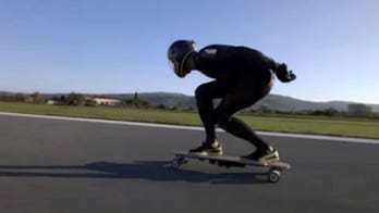 Watch this guy hit 60 MPH on an electric longboard, set a world record, and crash