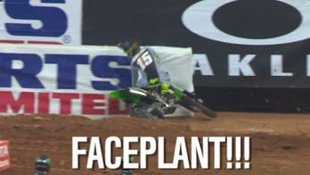 NASCAR driver Clint Bowyer hits the wall...on a motorcycle!