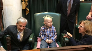 Rhode Island boy with terminal cancer gets own license plate
