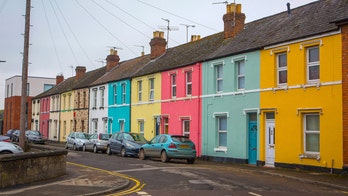 Neighbors all paint their homes bright colors,  say it boosts their mood
