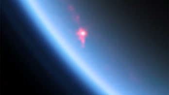 ET phone Earth? Light on Saturn's large moon Titan likely waves, scientists say