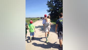 DONATE: Teen walks 40 miles with little brother on back.