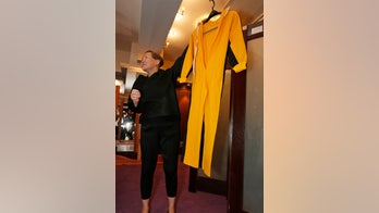 Bruce Lee's famous yellow jumpsuit  from 'Game of Death' up for auction