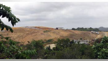 Overflowing landfills choke Puerto Rico amid economic crisis