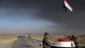 The Latest: Iraqi forces shell IS positions near Mosul
