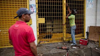 Looting leaves stores in ruins in Venezuela's Ciudad Bolivar