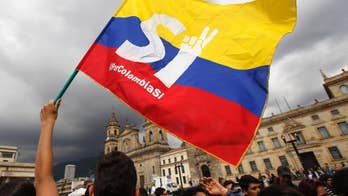 Colombian president meeting rival Uribe in bid to save peace